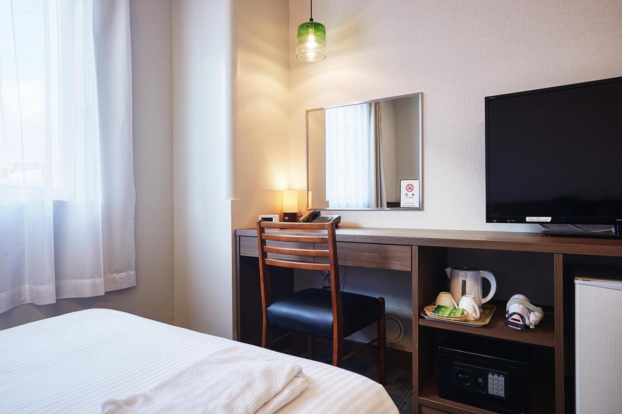 RJ Hotel Naha Buitenkant foto