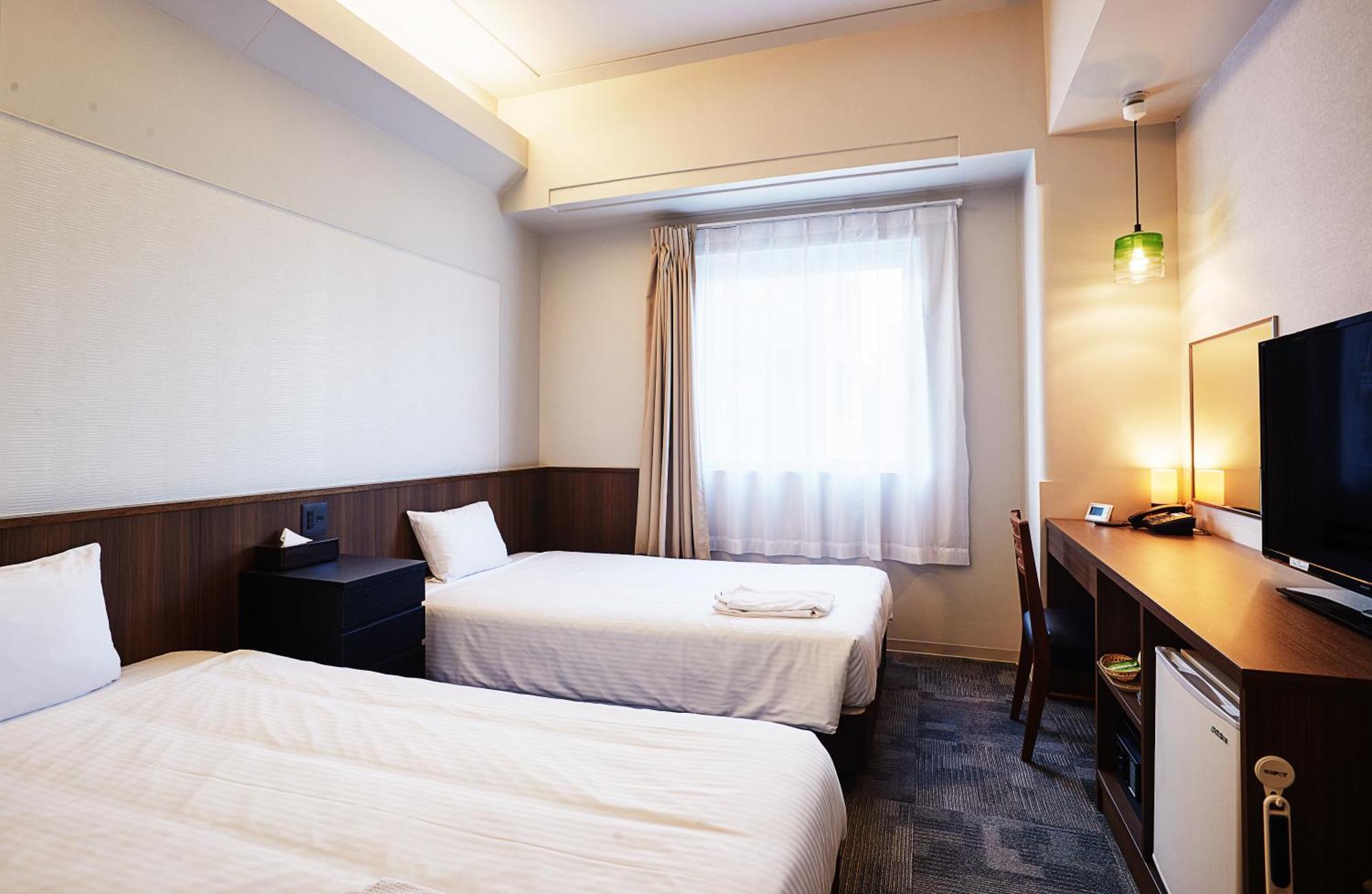 RJ Hotel Naha Buitenkant foto