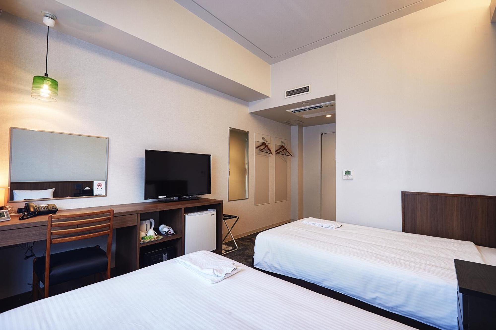 RJ Hotel Naha Buitenkant foto