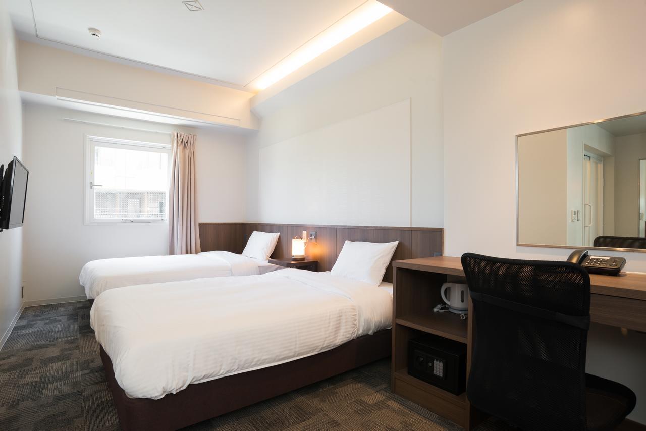 RJ Hotel Naha Buitenkant foto